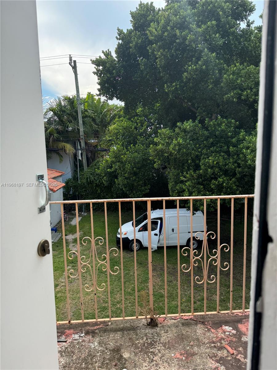 825 Alton Road, Unit 8 Miami Beach, FL 33139 - Photo 9 of 11 a view of a house with a yard