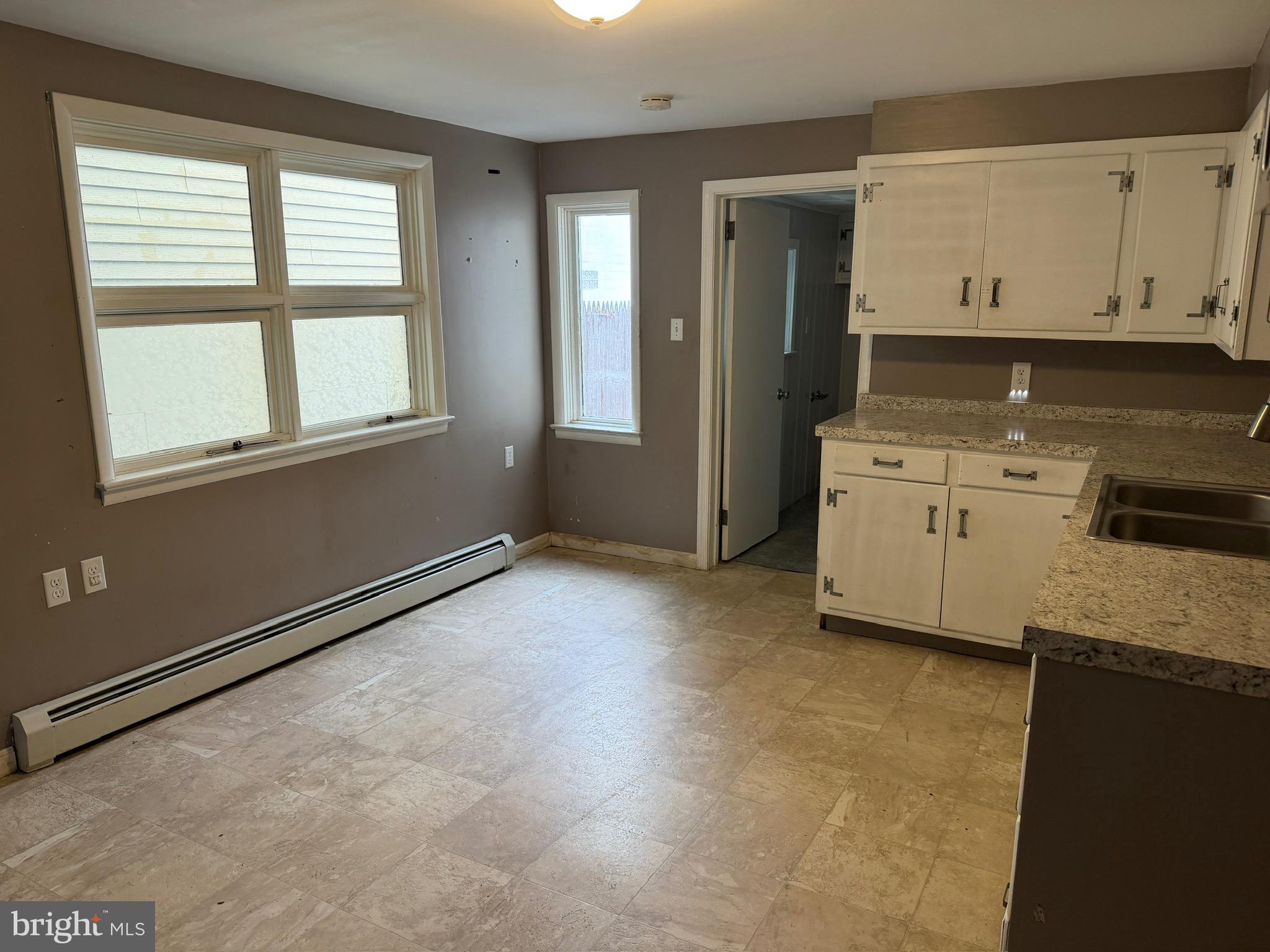 125 South Main Street Manheim, PA 17545 - Photo 14 of 27 an empty room with windows