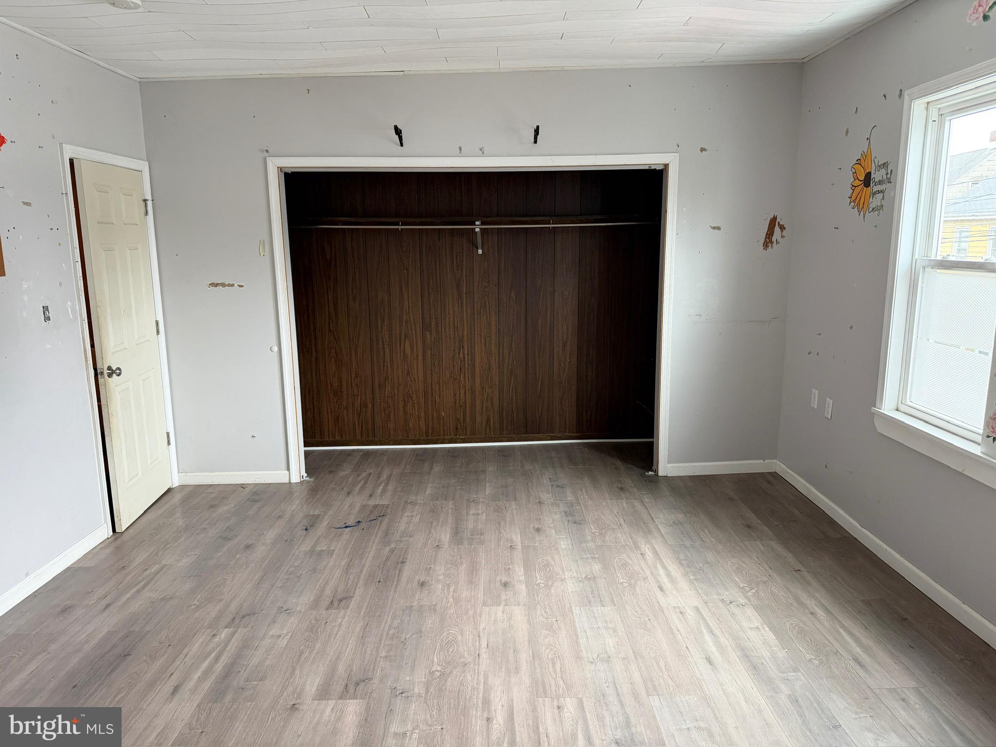 125 South Main Street Manheim, PA 17545 - Photo 18 of 27 an empty room with windows and entrance