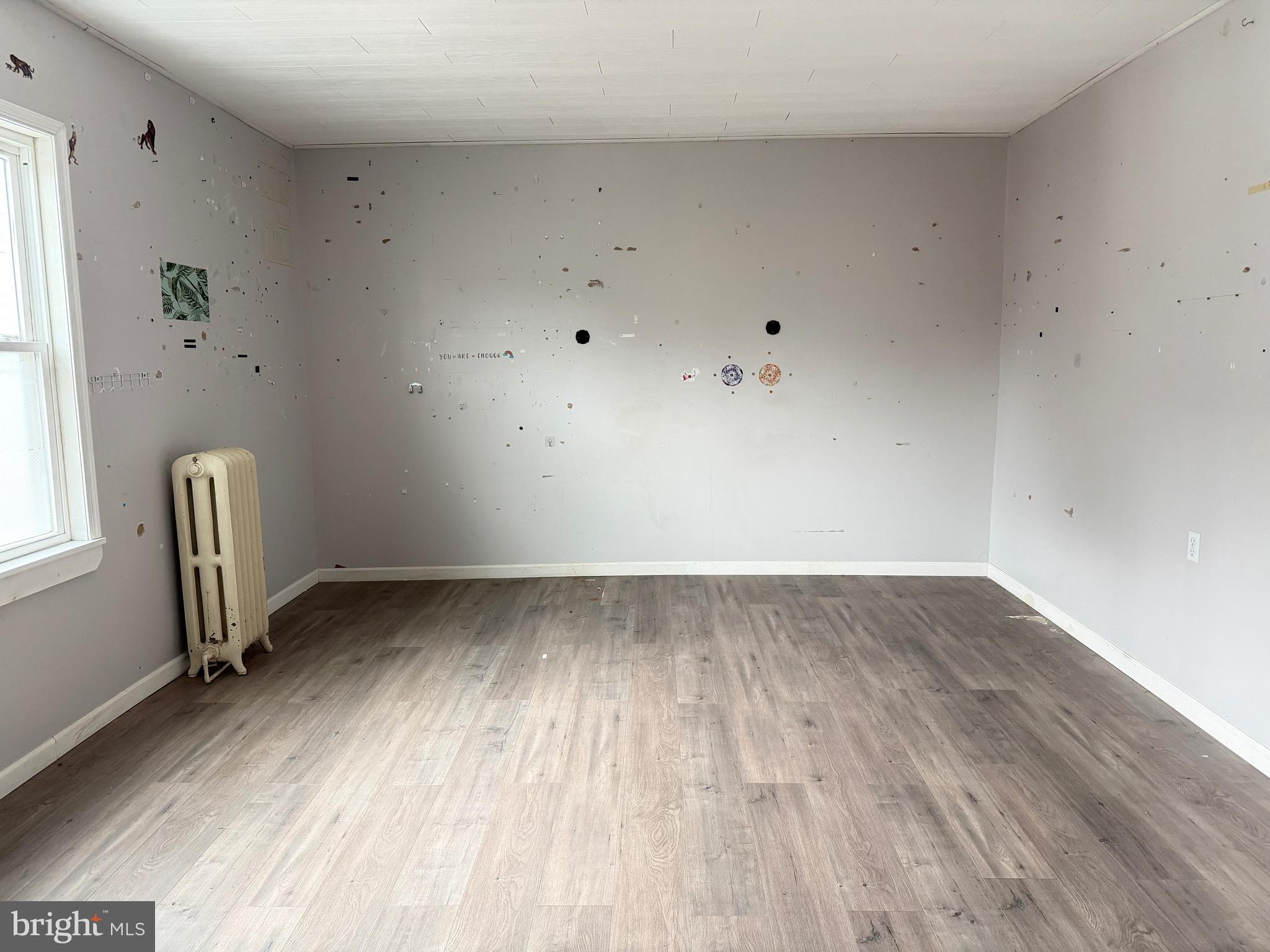 125 South Main Street Manheim, PA 17545 - Photo 20 of 27 a view of room with hardwood floor and window