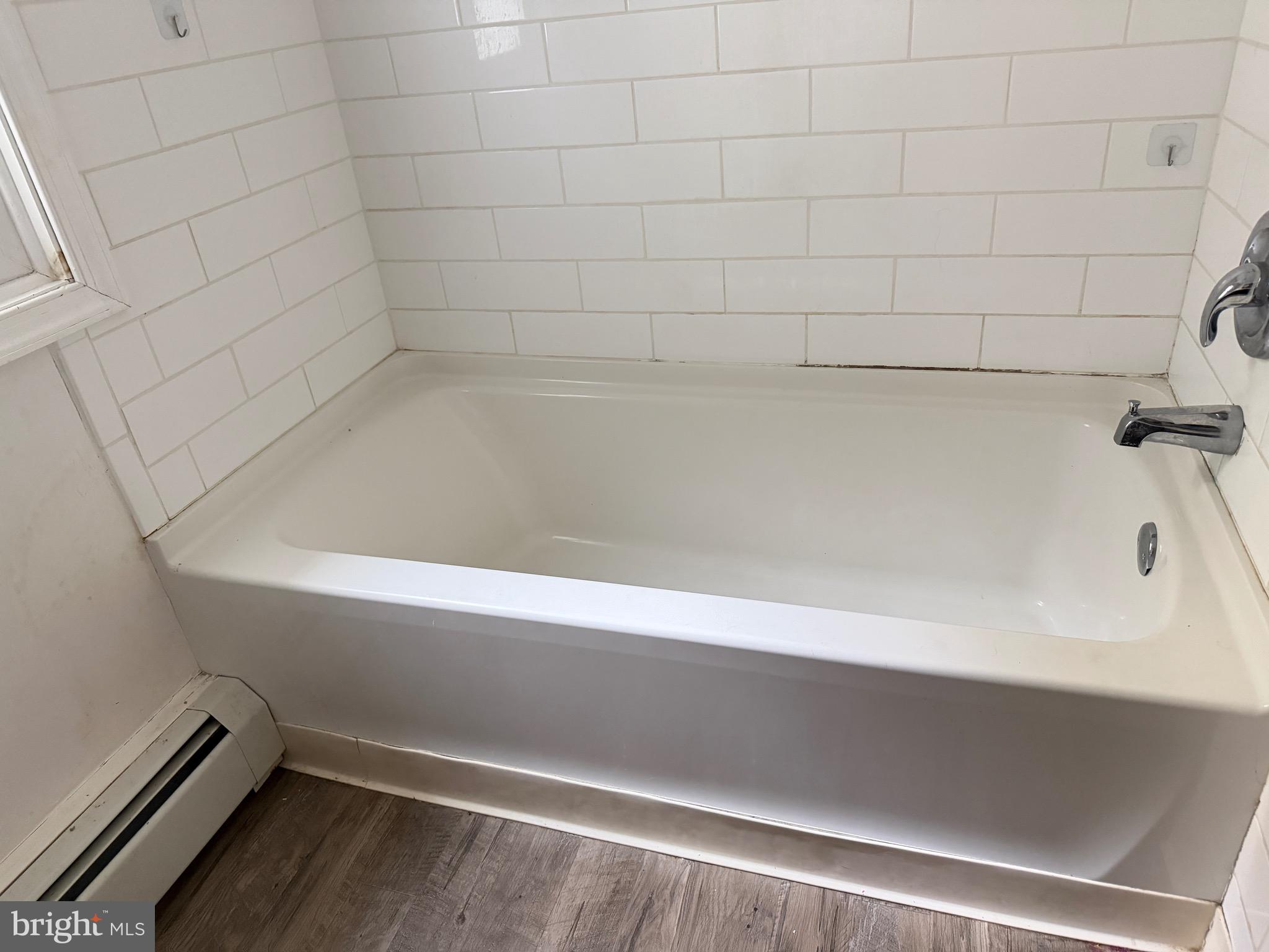 125 South Main Street Manheim, PA 17545 - Photo 22 of 27 a bathroom with a bathtub