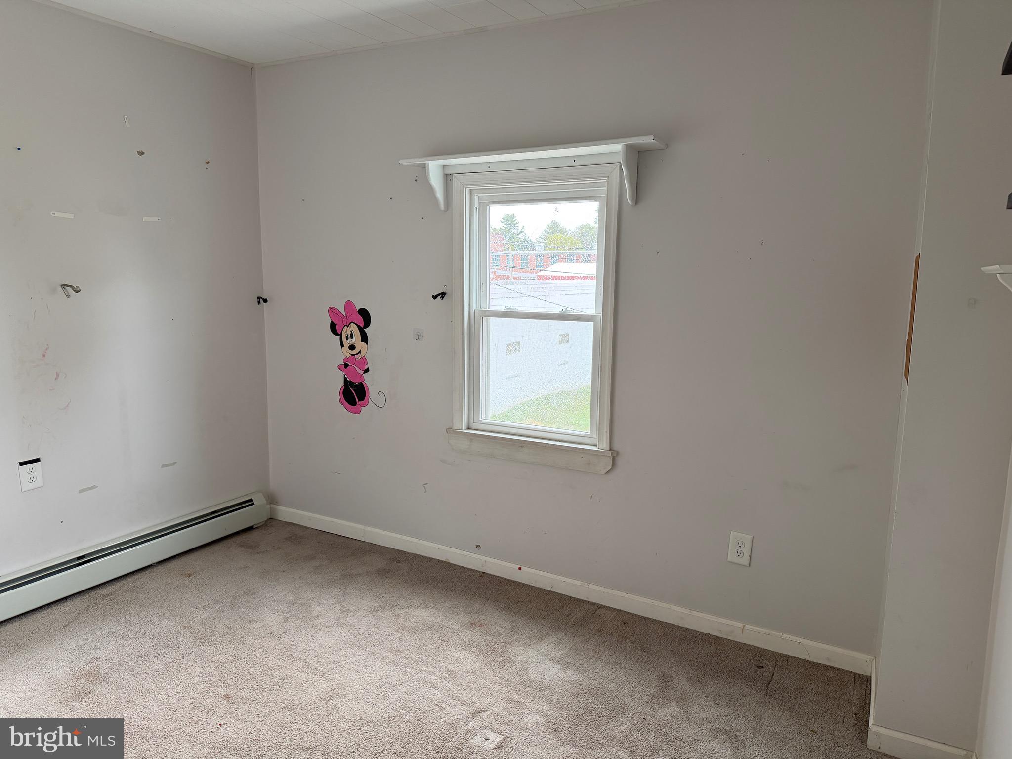 125 South Main Street Manheim, PA 17545 - Photo 26 of 27 an empty room with windows