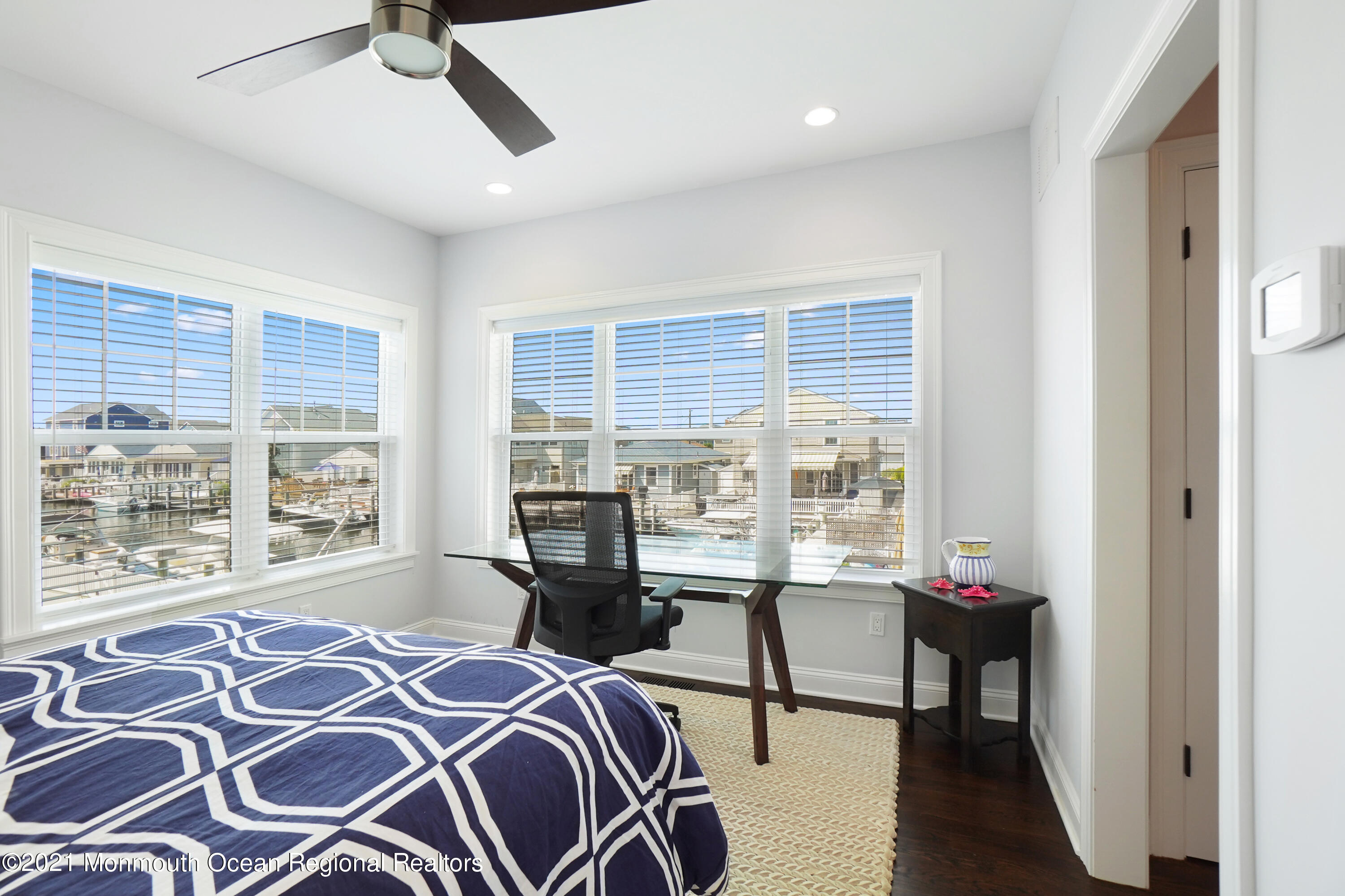 204 North Lagoon Road Lavallette, NJ 08735 - Photo 12 of 44 a bedroom with a bed and a window