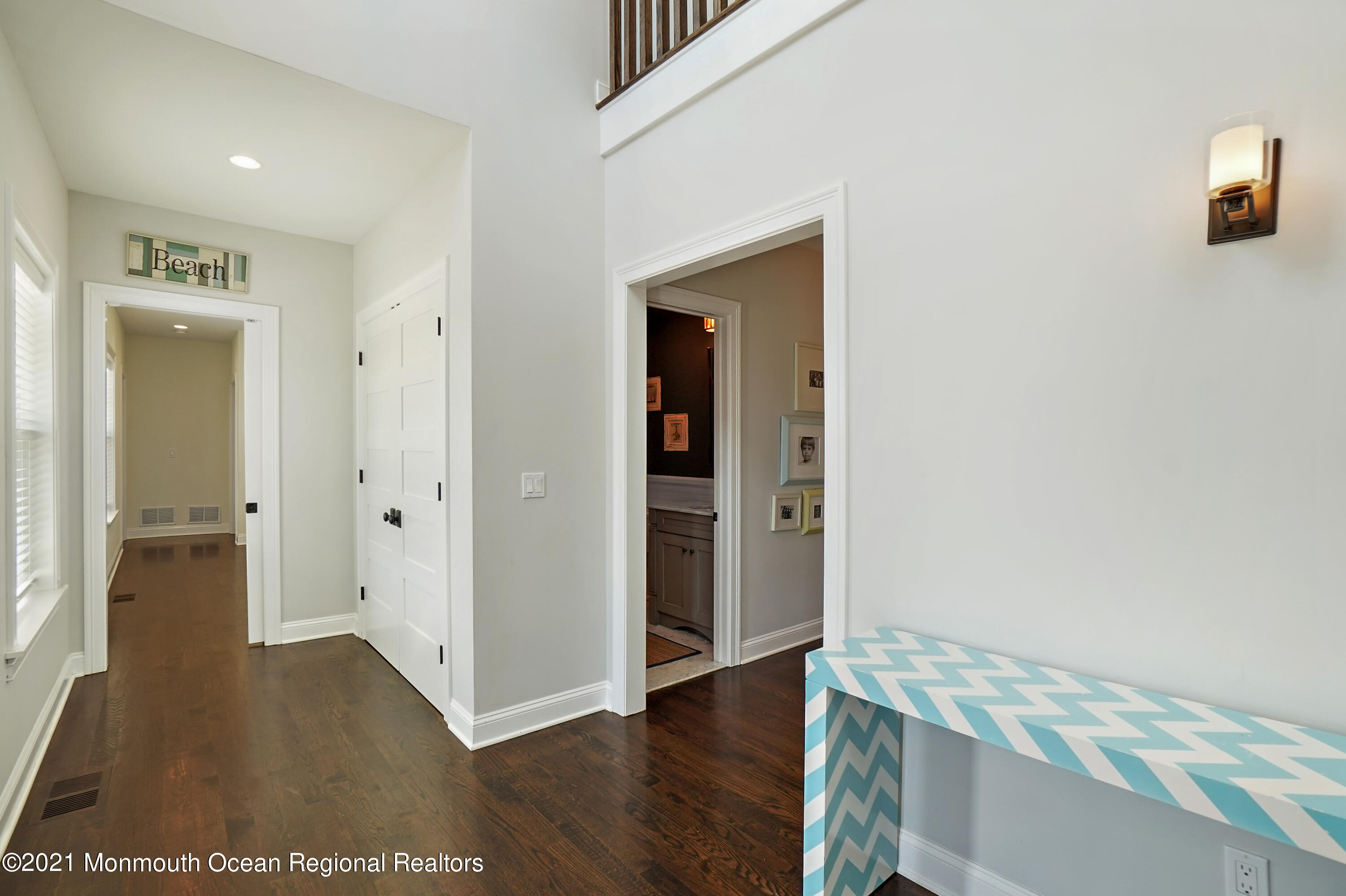 204 North Lagoon Road Lavallette, NJ 08735 - Photo 17 of 44 a view of a hallway with wooden floor