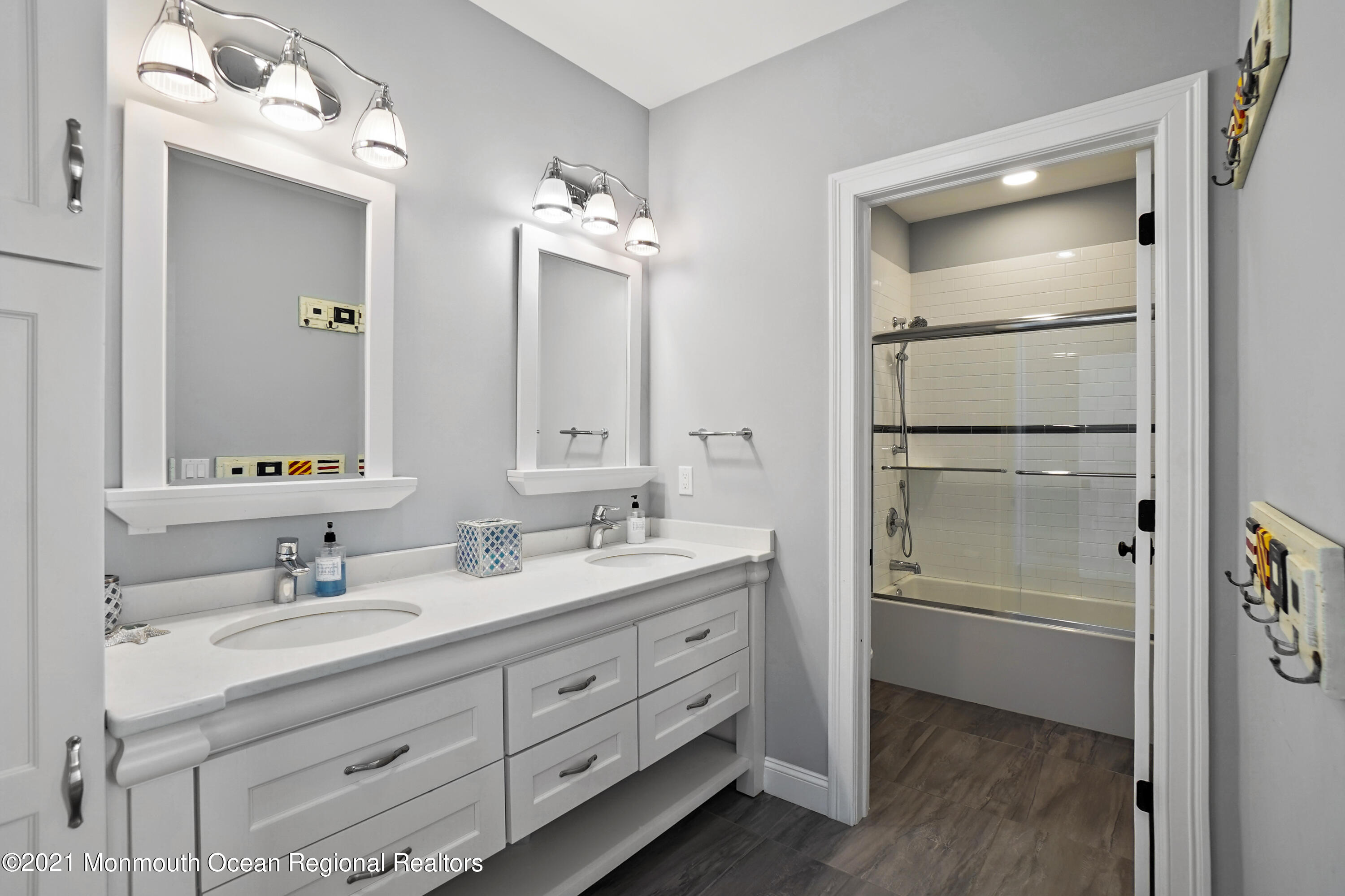204 North Lagoon Road Lavallette, NJ 08735 - Photo 21 of 44 a bathroom with a double vanity sink mirror and