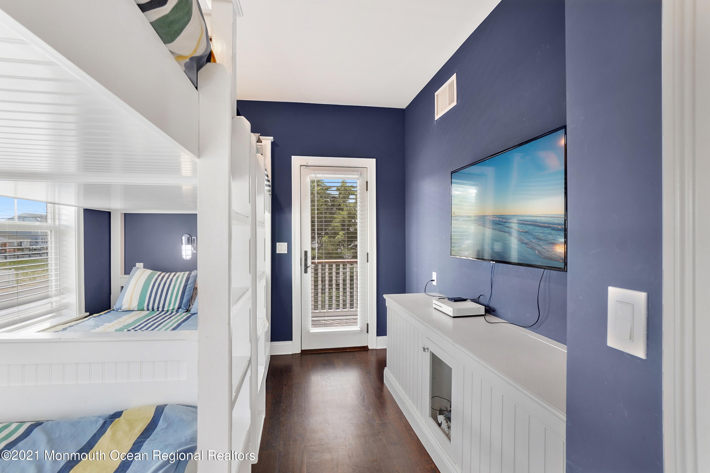 204 North Lagoon Road Lavallette, NJ 08735 - Photo 24 of 44 a bathroom with a sink and a large mirror