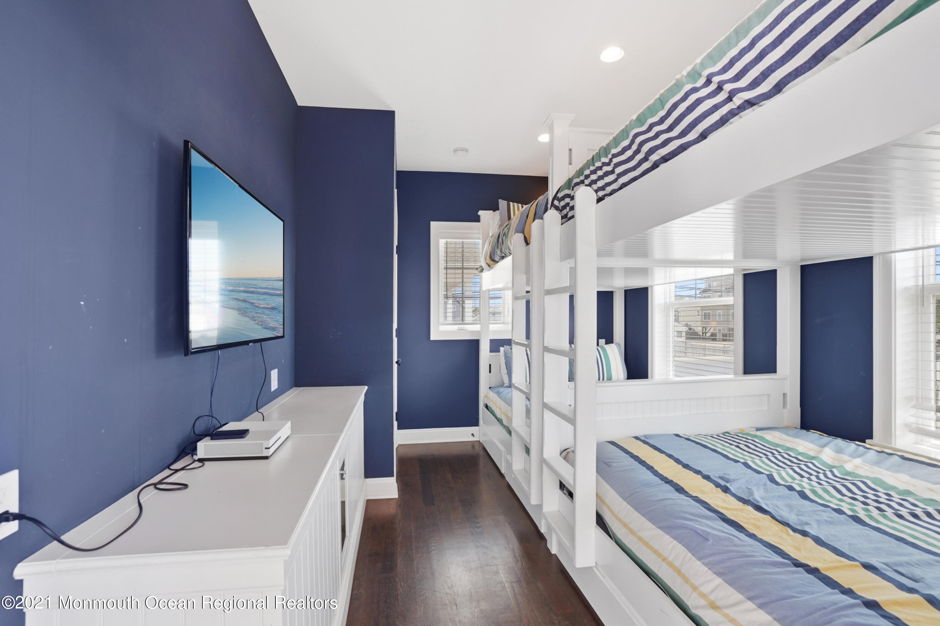 204 North Lagoon Road Lavallette, NJ 08735 - Photo 25 of 44 a bathroom with a sink a mirror and a bathtub