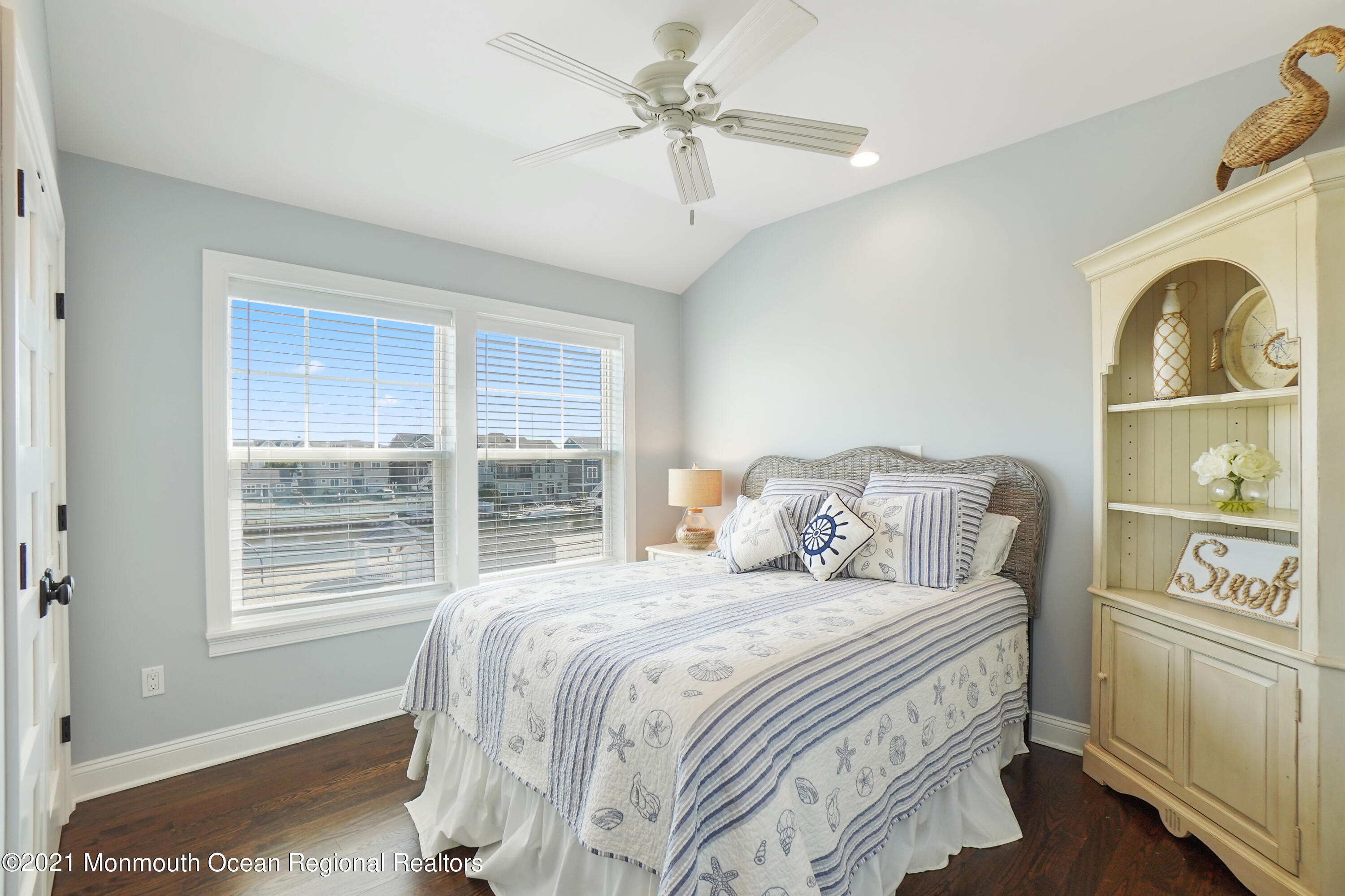 204 North Lagoon Road Lavallette, NJ 08735 - Photo 27 of 44 a bedroom with a bed and a window
