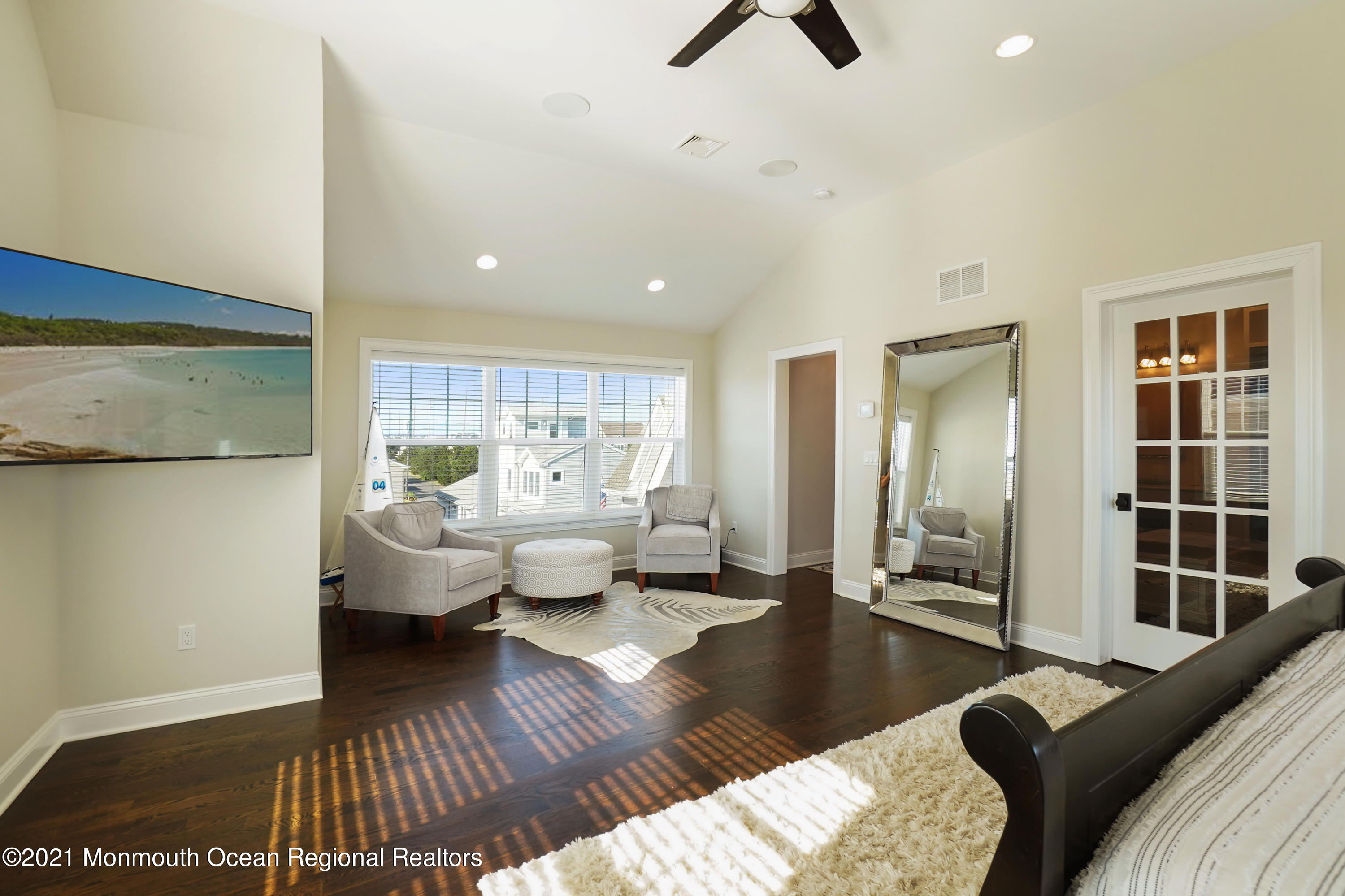 204 North Lagoon Road Lavallette, NJ 08735 - Photo 30 of 44 a living room with furniture or window and a table