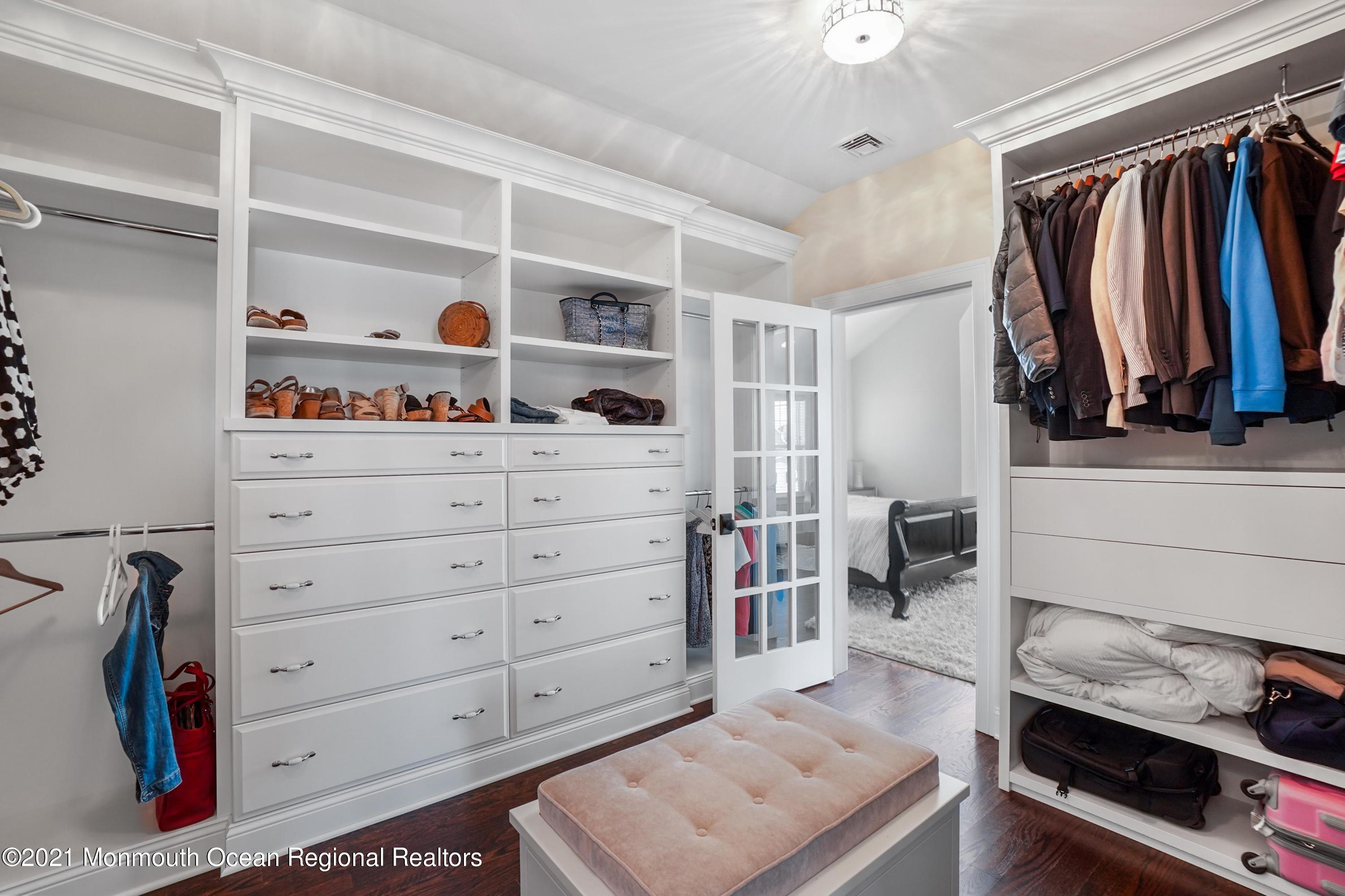 204 North Lagoon Road Lavallette, NJ 08735 - Photo 31 of 44 a view of walk in closet with clothes and shoes