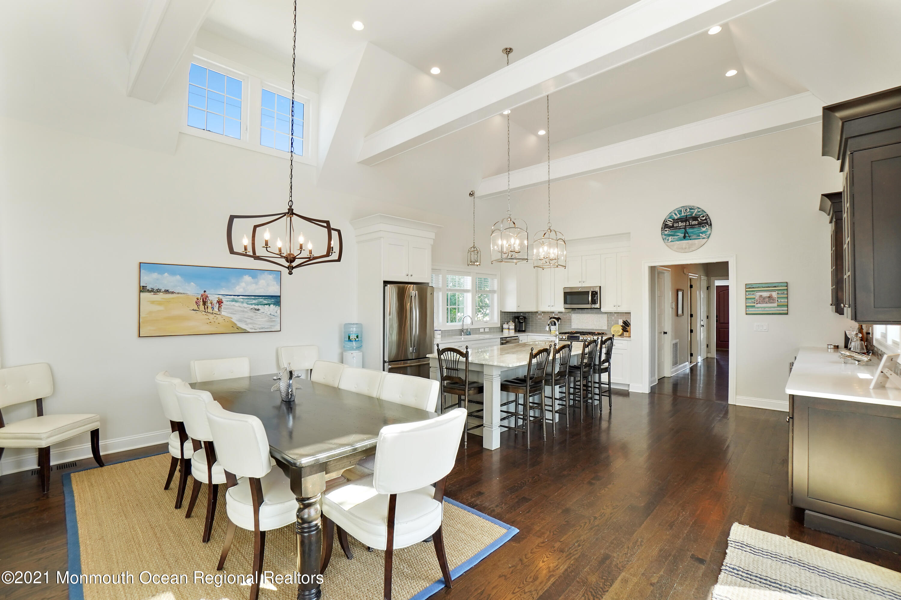 204 North Lagoon Road Lavallette, NJ 08735 - Photo 5 of 44 a view of a dining room with furniture wooden floor and chandelier