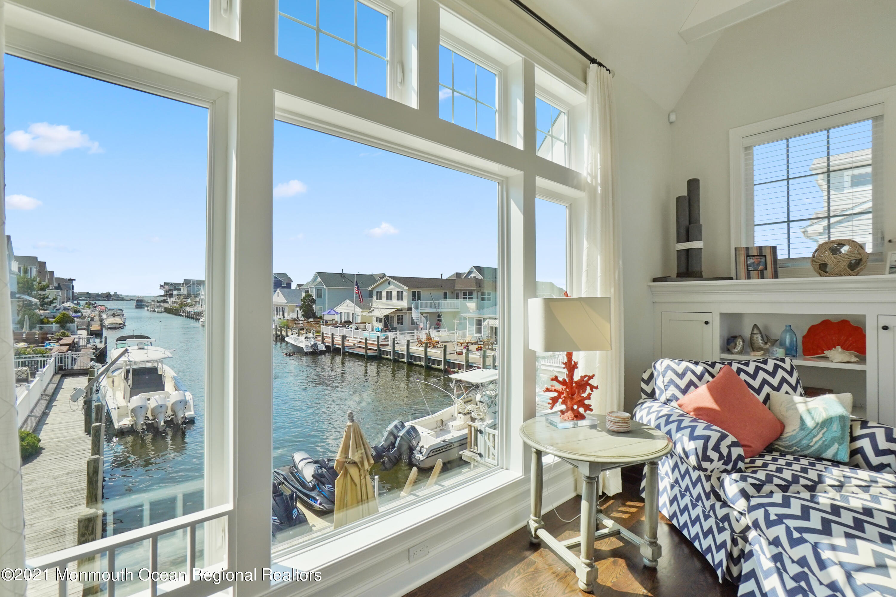 204 North Lagoon Road Lavallette, NJ 08735 - Photo 8 of 44 a outdoor living space with furniture and a floor to ceiling window