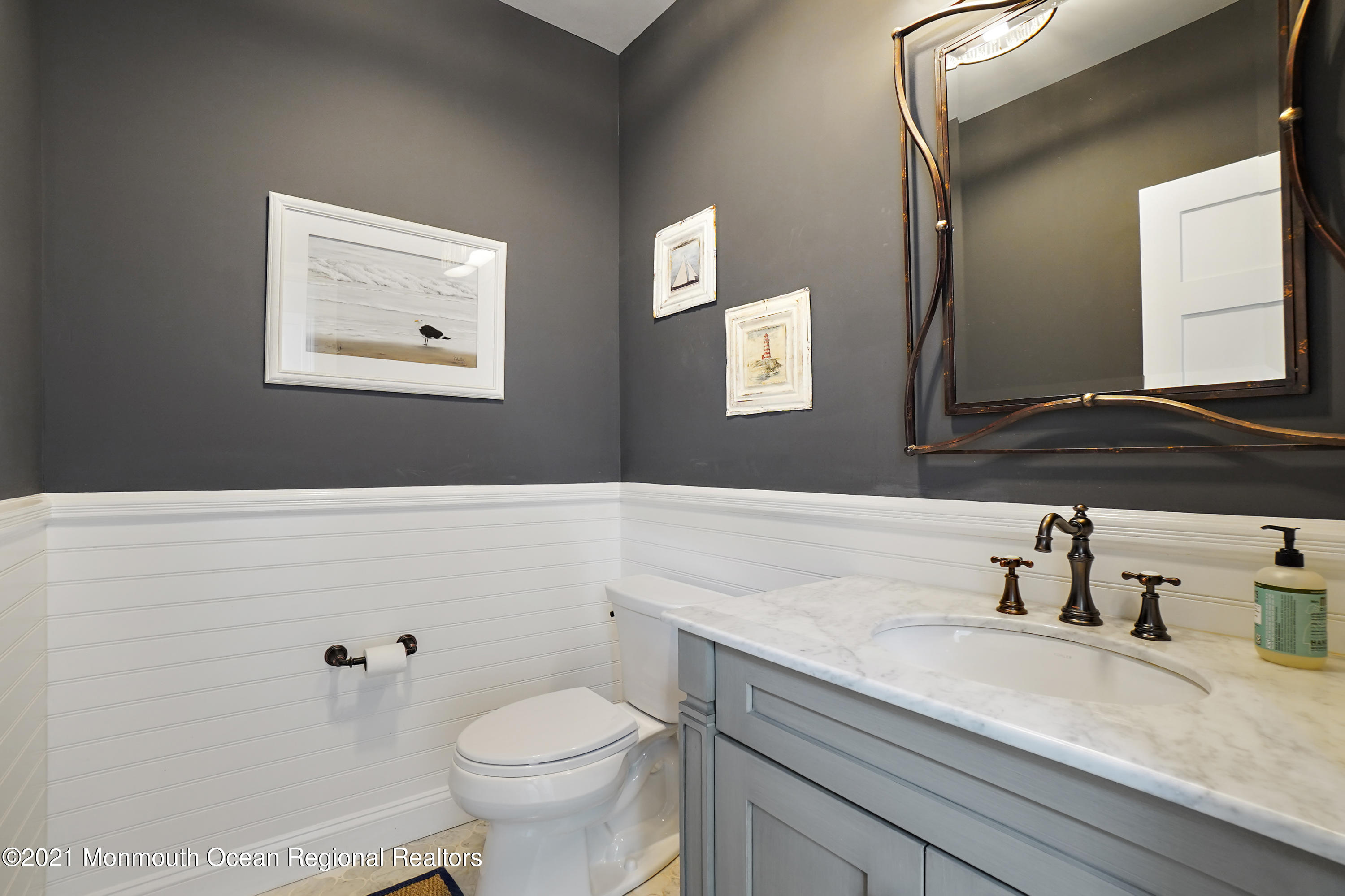 204 North Lagoon Road Lavallette, NJ 08735 - Photo 10 of 44 a bathroom with a granite countertop toilet sink and mirror