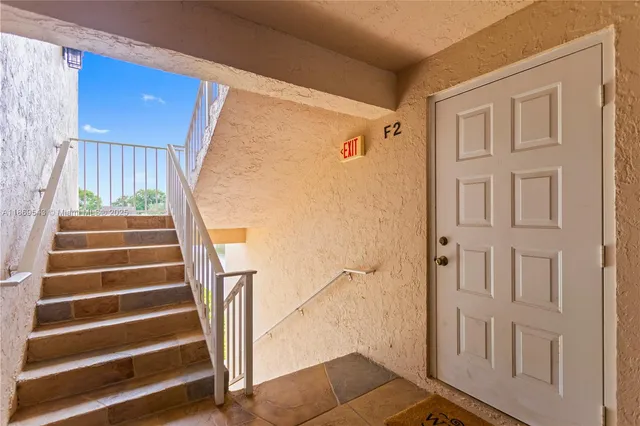 a view of an entryway with staircase