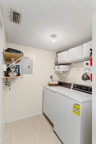 a kitchen with stainless steel appliances a stove a refrigerator and a sink
