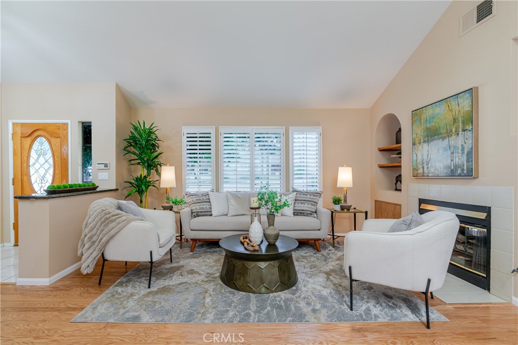 1049 Fairview Avenue, Unit 5 Arcadia, CA 91007 - Photo 3 of 26 a living room with furniture and a potted plant