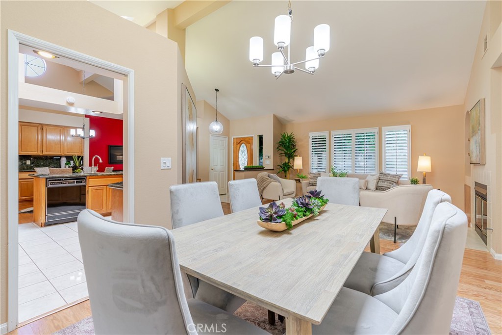 1049 Fairview Avenue, Unit 5 Arcadia, CA 91007 - Photo 5 of 26 a view of a dining room with furniture and a chandelier