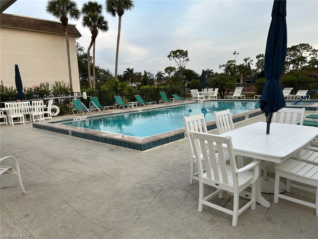 5651 Rattlesnake Hamm Road, Unit C107 Naples, FL 34113 - Photo 19 of 20 COMMUNITY POOL