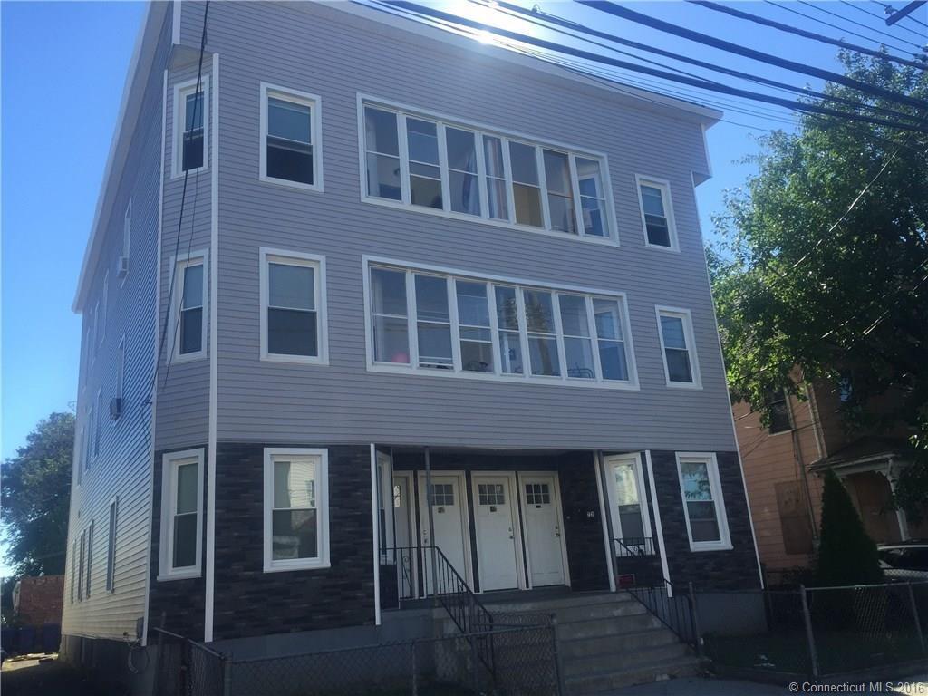 271 Lindley Street Bridgeport, CT 06606 - Photo 1 of 1 a front view of a building with glass windows