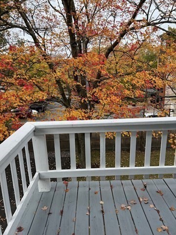 84 Aberdeen Avenue, Unit 1 Cambridge, MA 02138 - Photo 11 of 17 a view of wooden house with a large window
