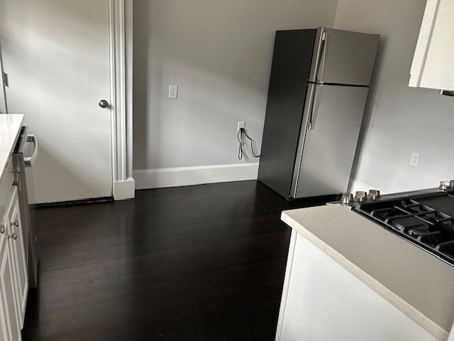 84 Aberdeen Avenue, Unit 1 Cambridge, MA 02138 - Photo 13 of 17 a view of kitchen with stainless steel appliances a refrigerator and a stove
