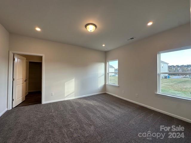 6128 Busch Way Midland, NC 28107 - Photo 14 of 26 a view of an empty room with a window