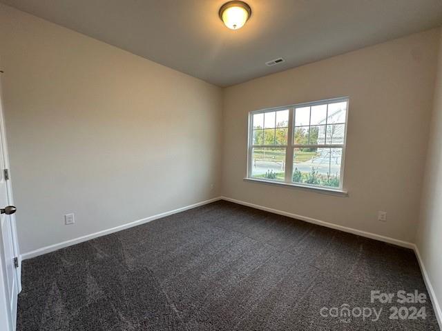 6128 Busch Way Midland, NC 28107 - Photo 20 of 26 an empty room with windows