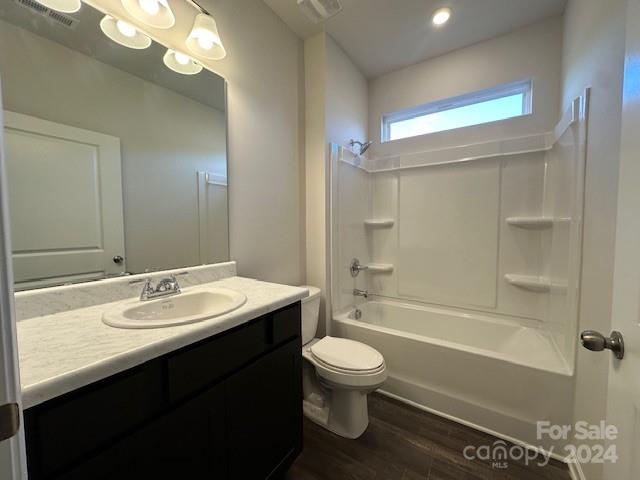 6128 Busch Way Midland, NC 28107 - Photo 21 of 26 a bathroom with a sink a toilet and shower