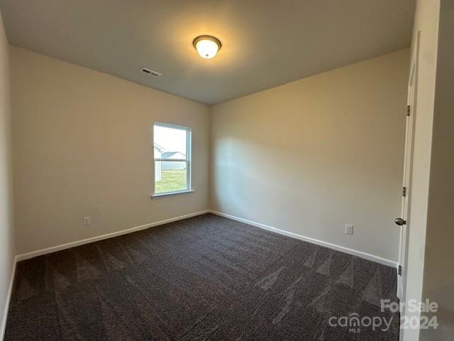 6128 Busch Way Midland, NC 28107 - Photo 22 of 26 a view of an empty room with a window