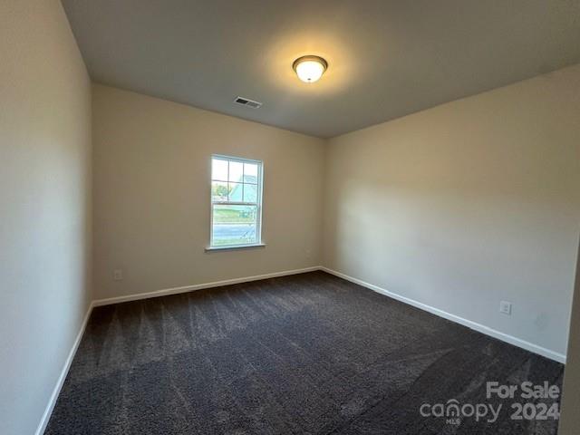 6128 Busch Way Midland, NC 28107 - Photo 23 of 26 an empty room with a window