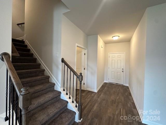 6128 Busch Way Midland, NC 28107 - Photo 6 of 26 a view of a hallway with wooden floor and entryway