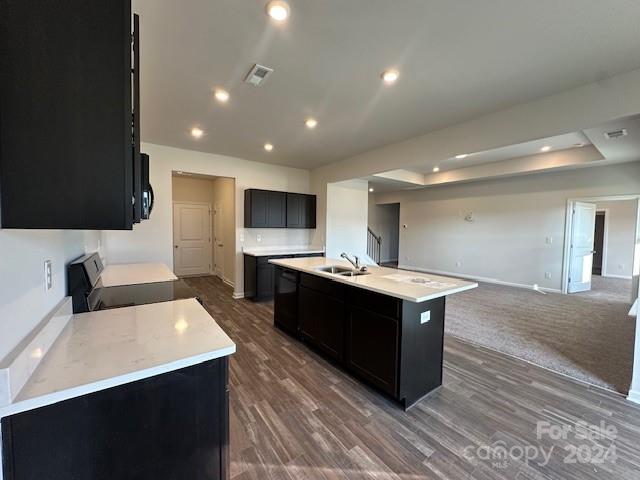 6128 Busch Way Midland, NC 28107 - Photo 9 of 26 a large kitchen with stainless steel appliances a large counter top and a stove