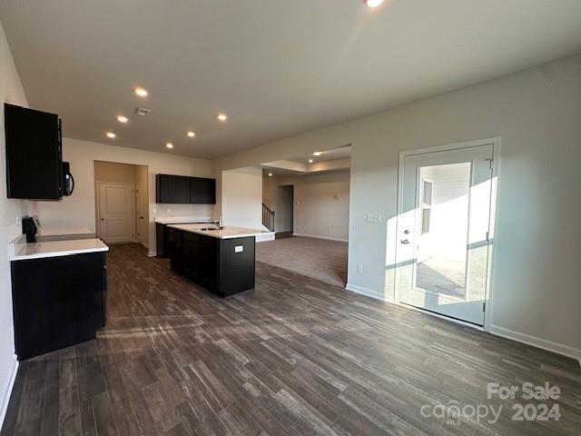 6128 Busch Way Midland, NC 28107 - Photo 10 of 26 a large kitchen with stainless steel appliances a large counter top