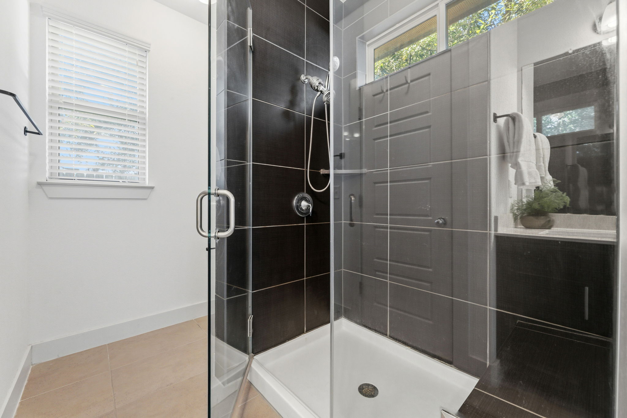 1007 Totis Road Austin, TX 78748 - Photo 26 of 37 a bathroom with a shower and a sink