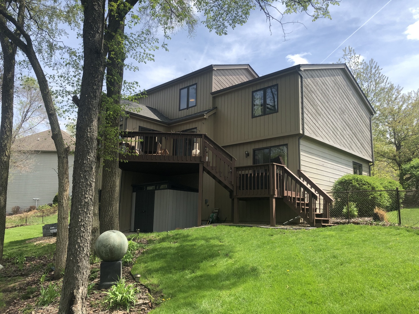 34 River Bend Road Montgomery, IL 60538 - Photo 28 of 33 a front view of a house with garden