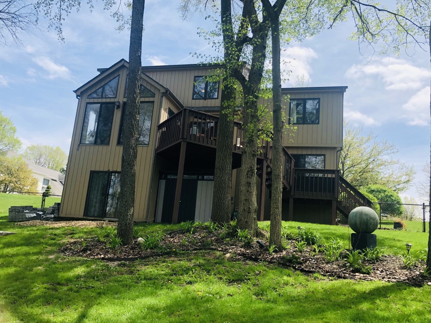 34 River Bend Road Montgomery, IL 60538 - Photo 29 of 33 a view of a house with a yard and plants