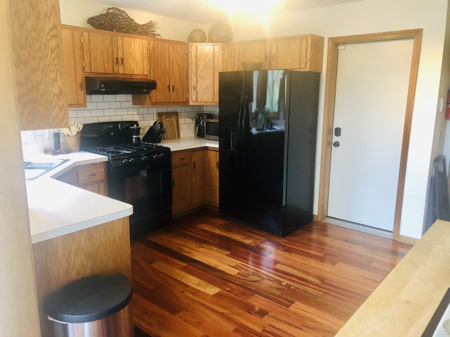 34 River Bend Road Montgomery, IL 60538 - Photo 9 of 33 a kitchen with a refrigerator and a stove