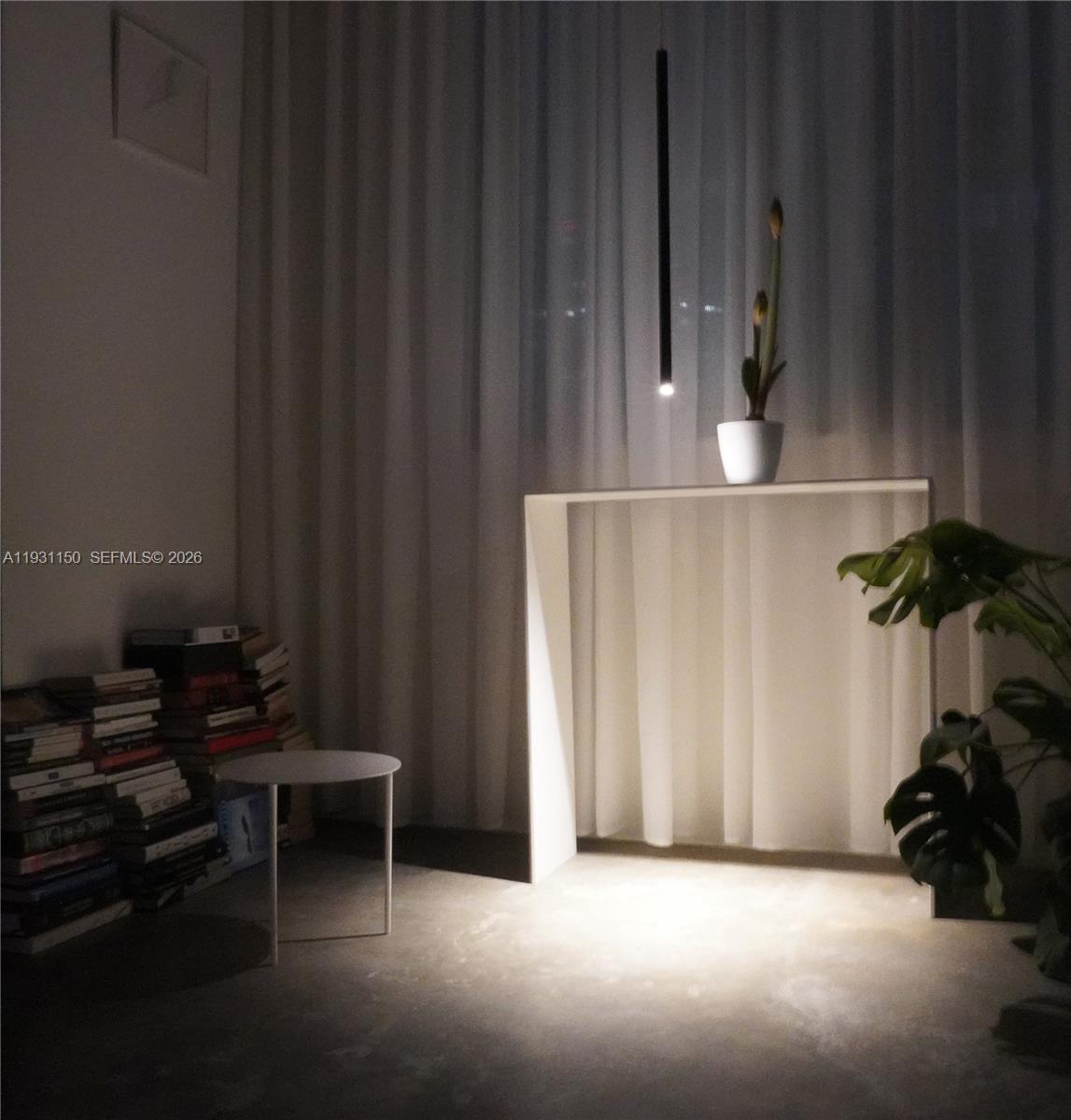 133 Northeast 2nd Avenue, Unit 1608 Miami, FL 33132 - Photo 12 of 55 Reading area with pendant lighting. At night.