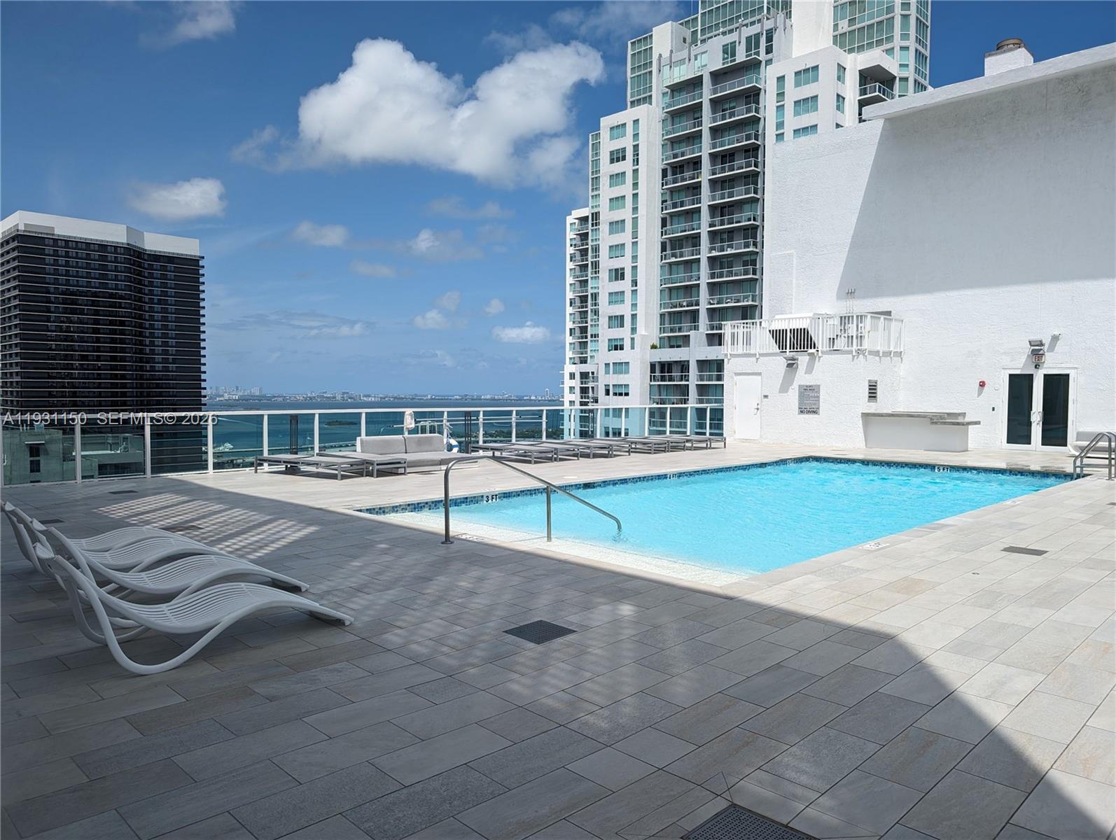 133 Northeast 2nd Avenue, Unit 1608 Miami, FL 33132 - Photo 43 of 55 Rooftop pool with hot tub.