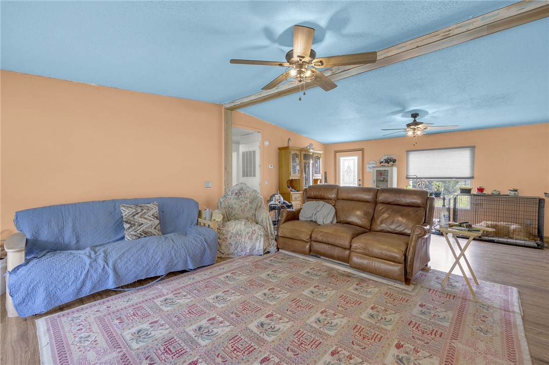1549 Bethany Church Road Belton, SC 29627 - Photo 31 of 36 Relax in this comfortable living space with overhead ceiling fans.