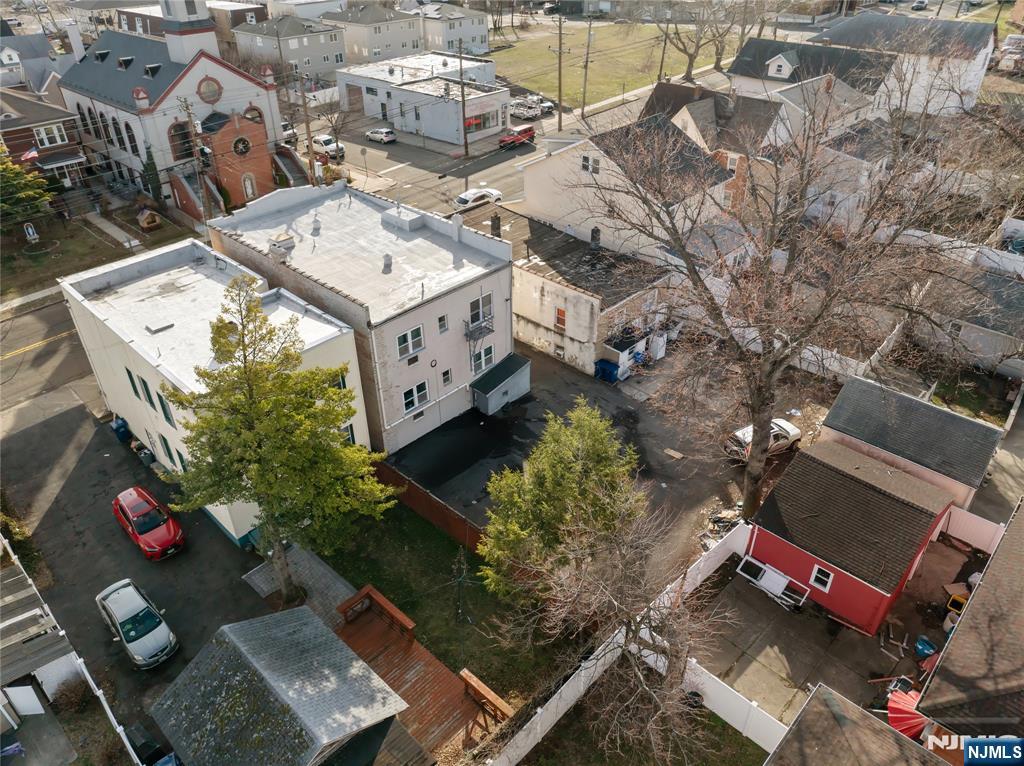 467 Hudson Street Hackensack, NJ 07601 - Photo 2 of 13 an aerial view of a house with a yard