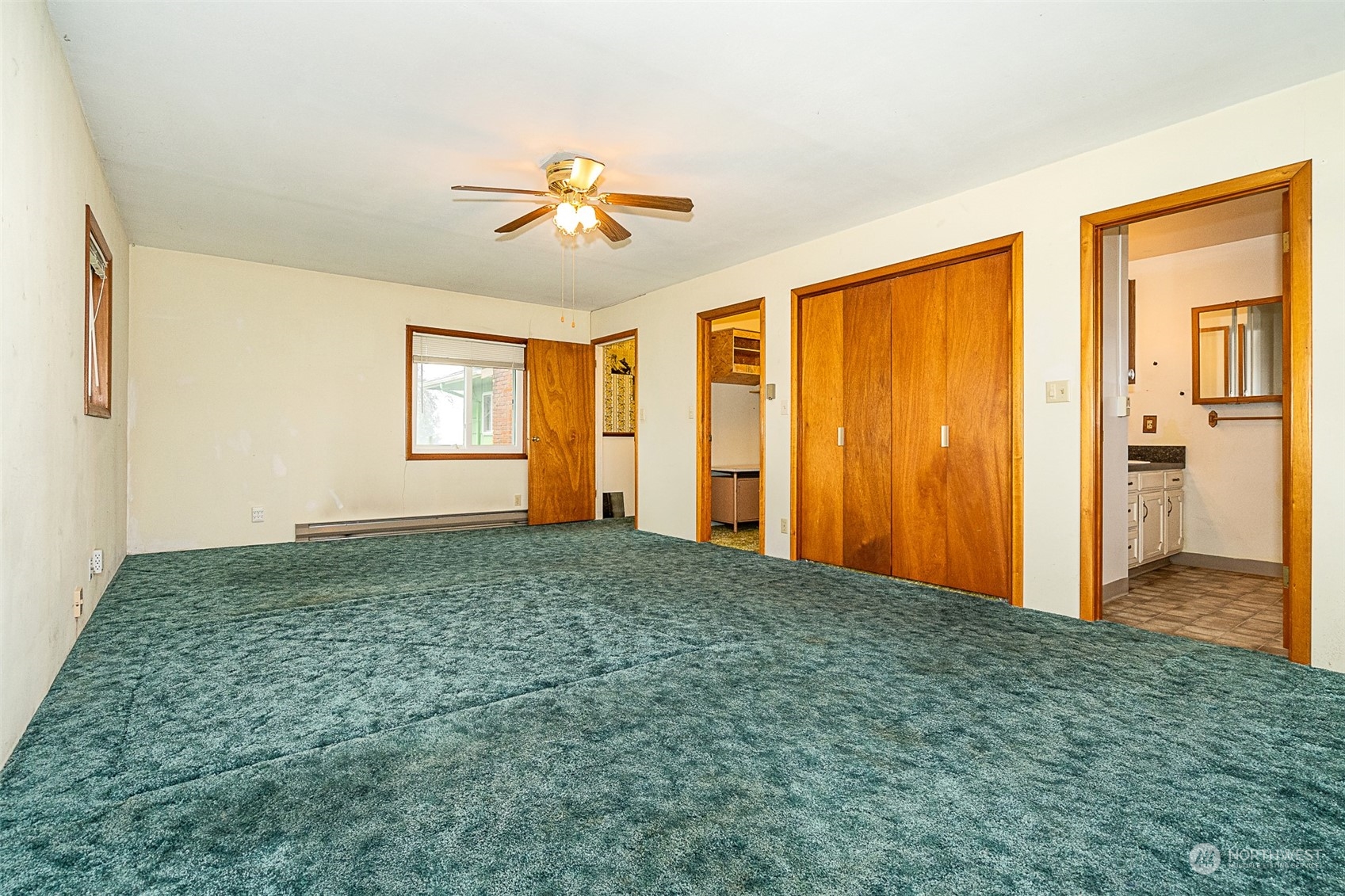 728 Rhoades Road Winlock, WA 98596 - Photo 11 of 40 a view of a livingroom with a chandelier fan and a window