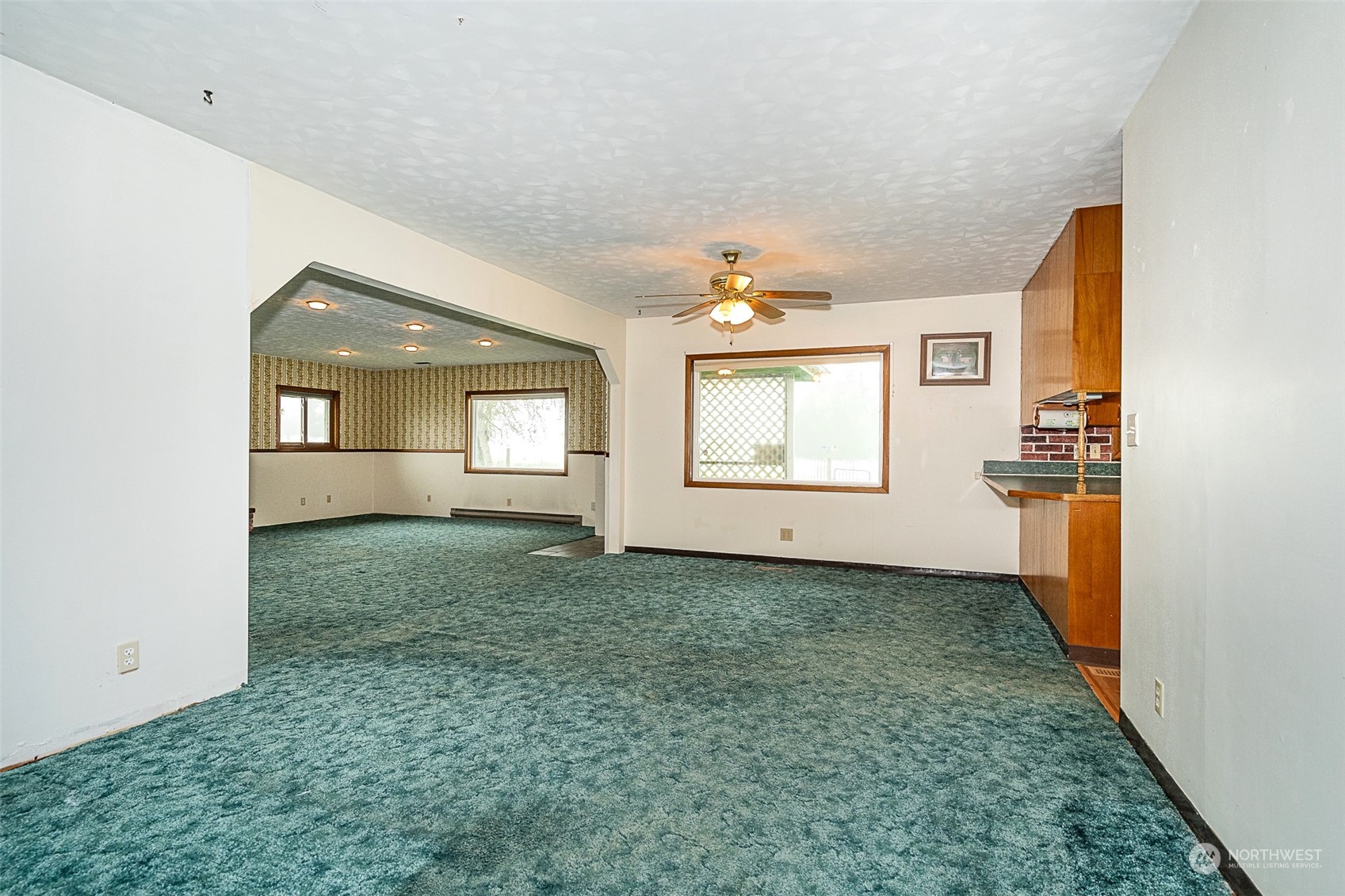 728 Rhoades Road Winlock, WA 98596 - Photo 14 of 40 an empty room with windows