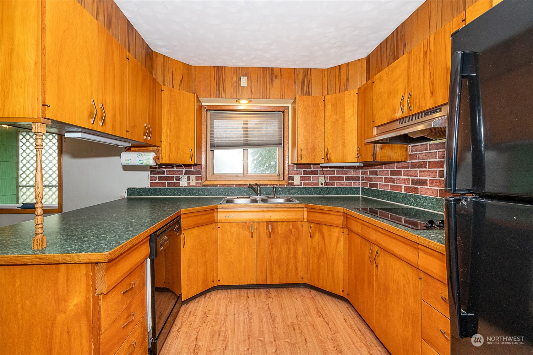728 Rhoades Road Winlock, WA 98596 - Photo 16 of 40 a view of a kitchen with a large window