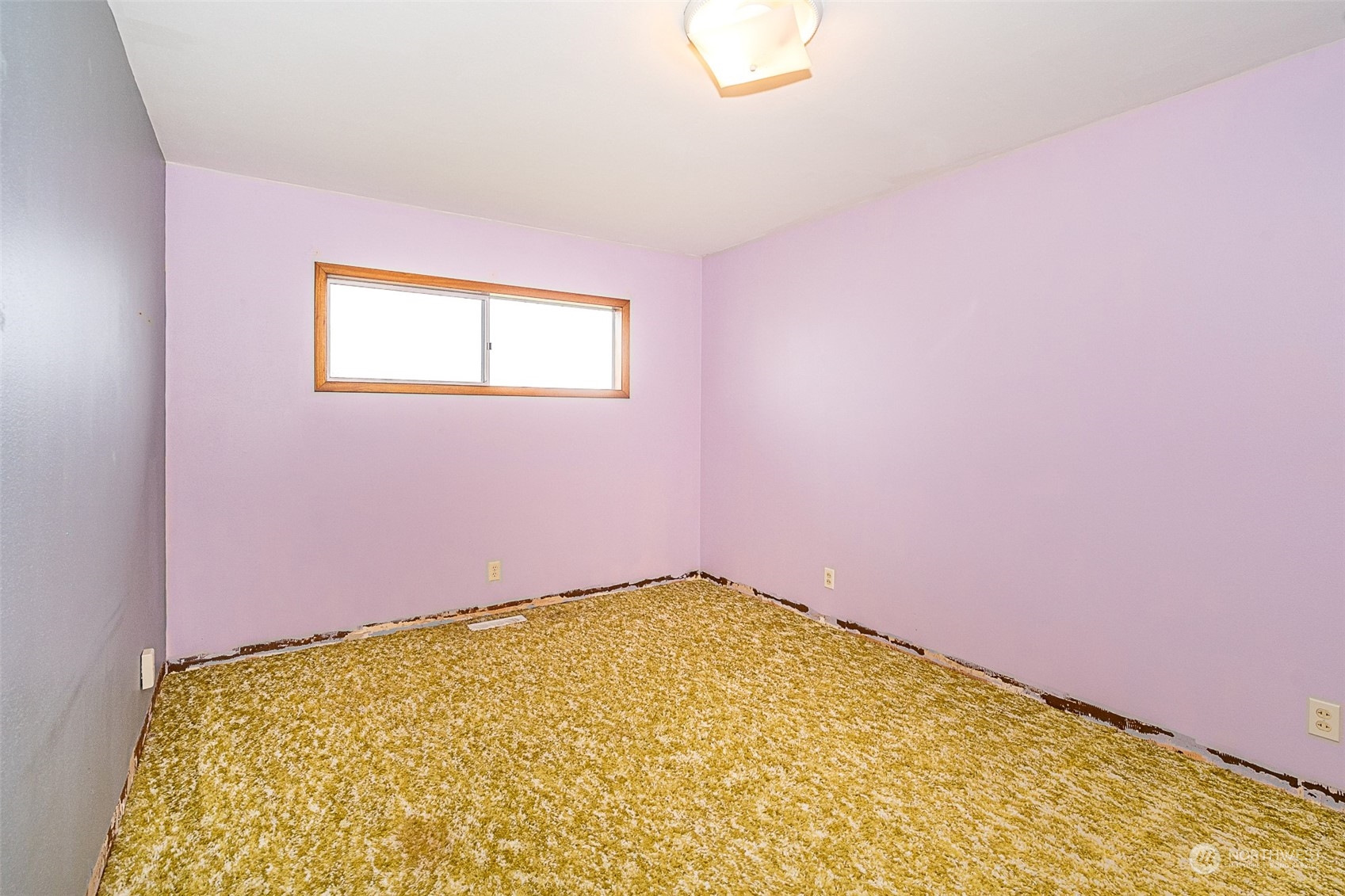 728 Rhoades Road Winlock, WA 98596 - Photo 20 of 40 a view of a big room with wooden floor and a bathroom