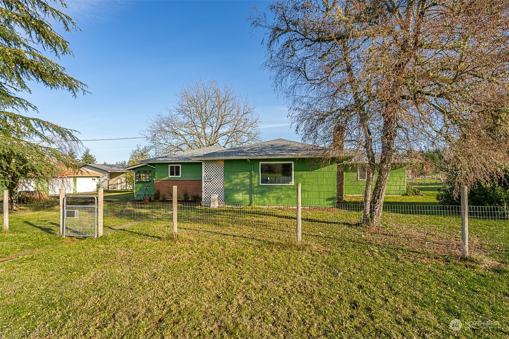 728 Rhoades Road Winlock, WA 98596 - Photo 2 of 40 front view of a house with a yard