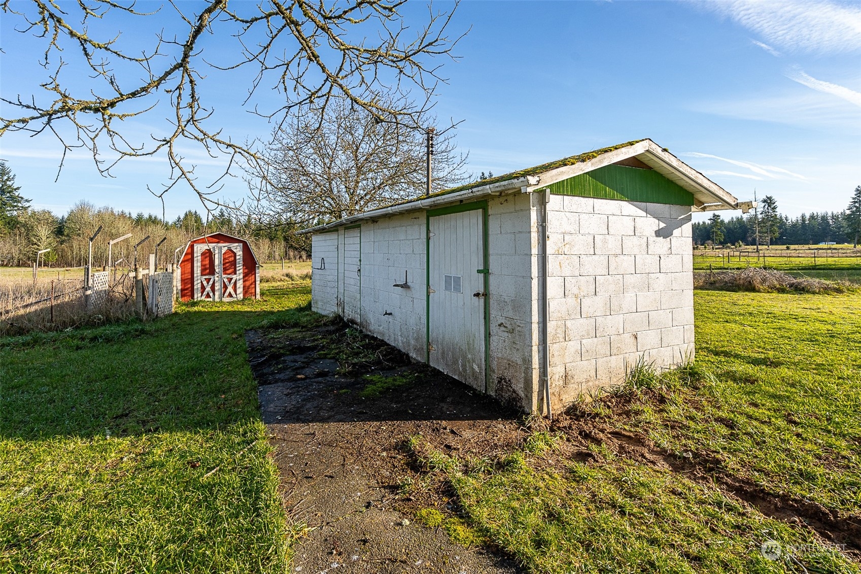 728 Rhoades Road Winlock, WA 98596 - Photo 34 of 40 a view of an entrance of the house and a yard
