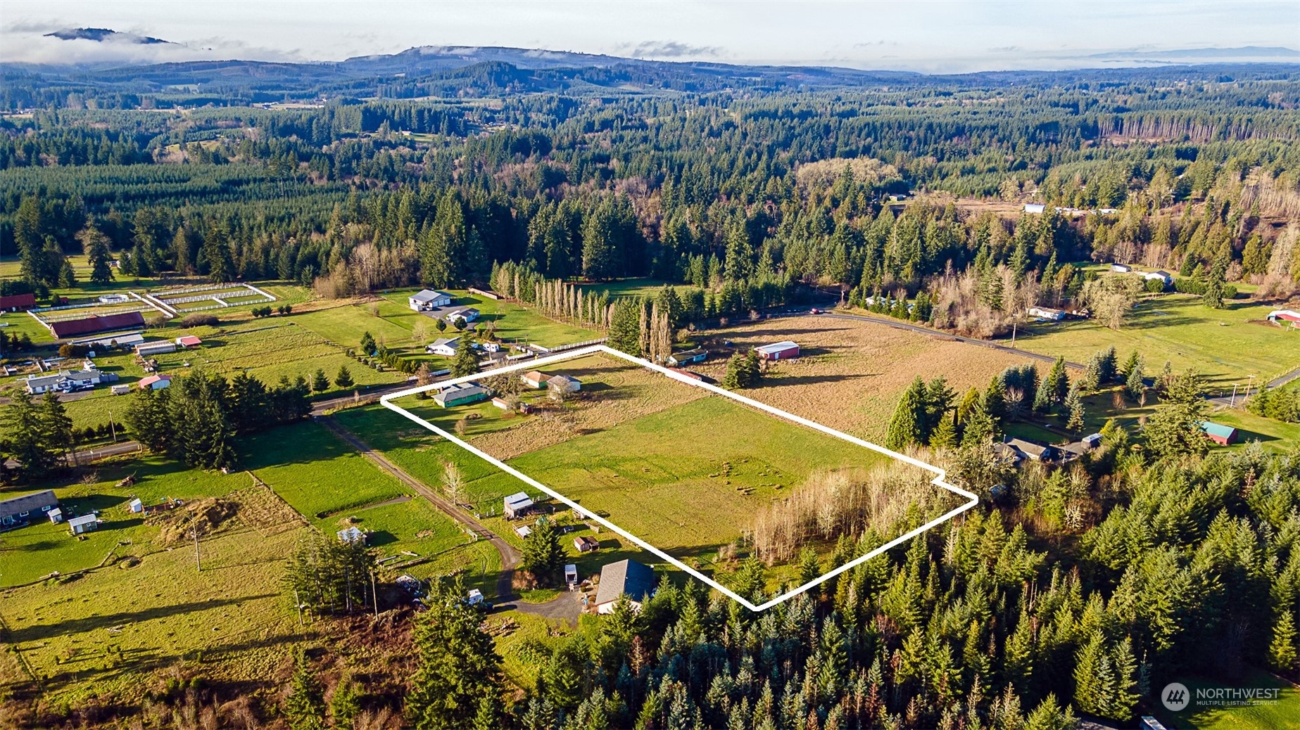 728 Rhoades Road Winlock, WA 98596 - Photo 4 of 40 a view of a swimming pool with a lake view