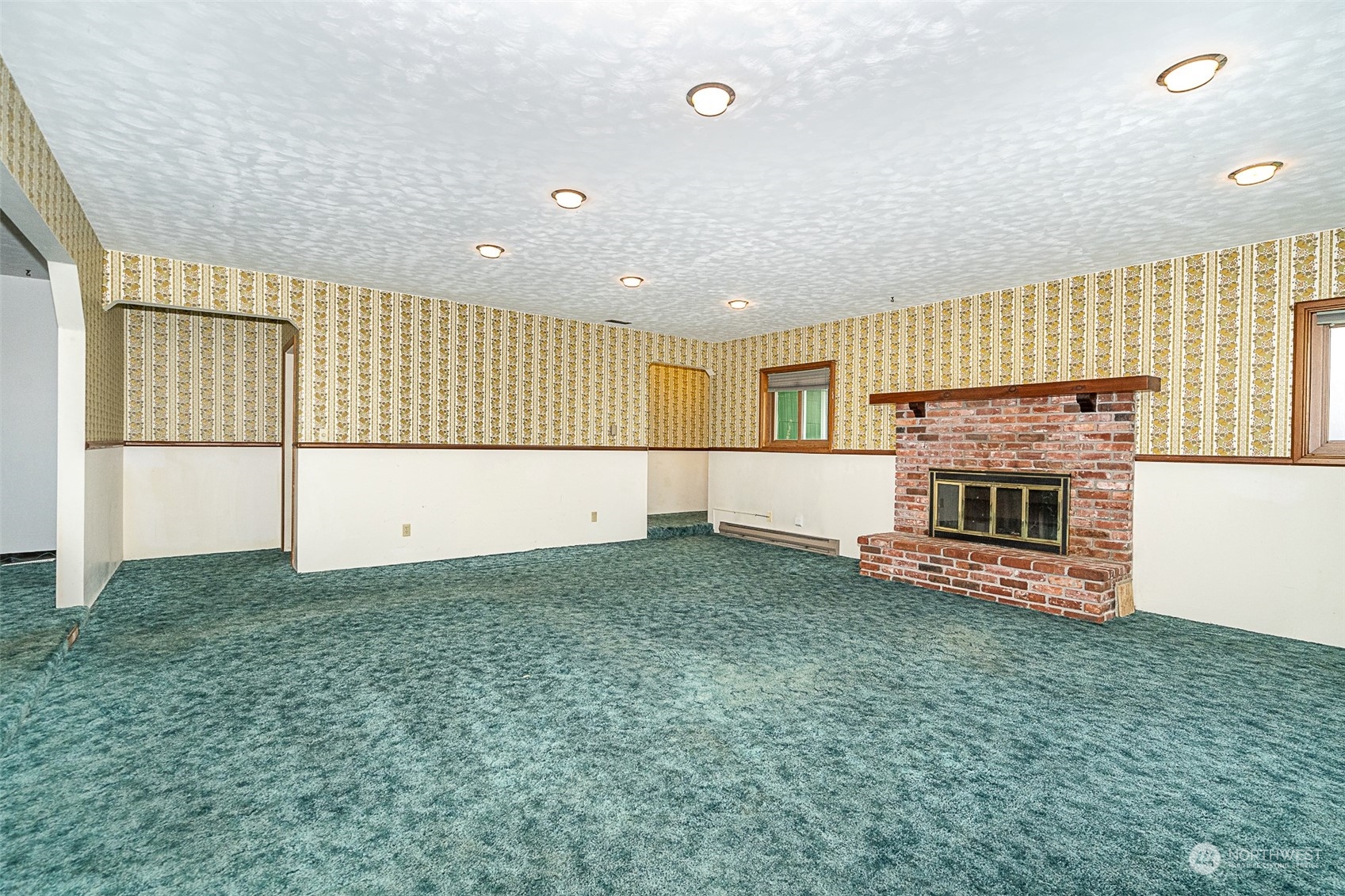 728 Rhoades Road Winlock, WA 98596 - Photo 7 of 40 a view of an empty room with a fireplace