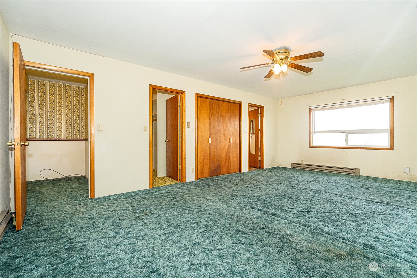 728 Rhoades Road Winlock, WA 98596 - Photo 10 of 40 a view of a livingroom with a chandelier fan and a window